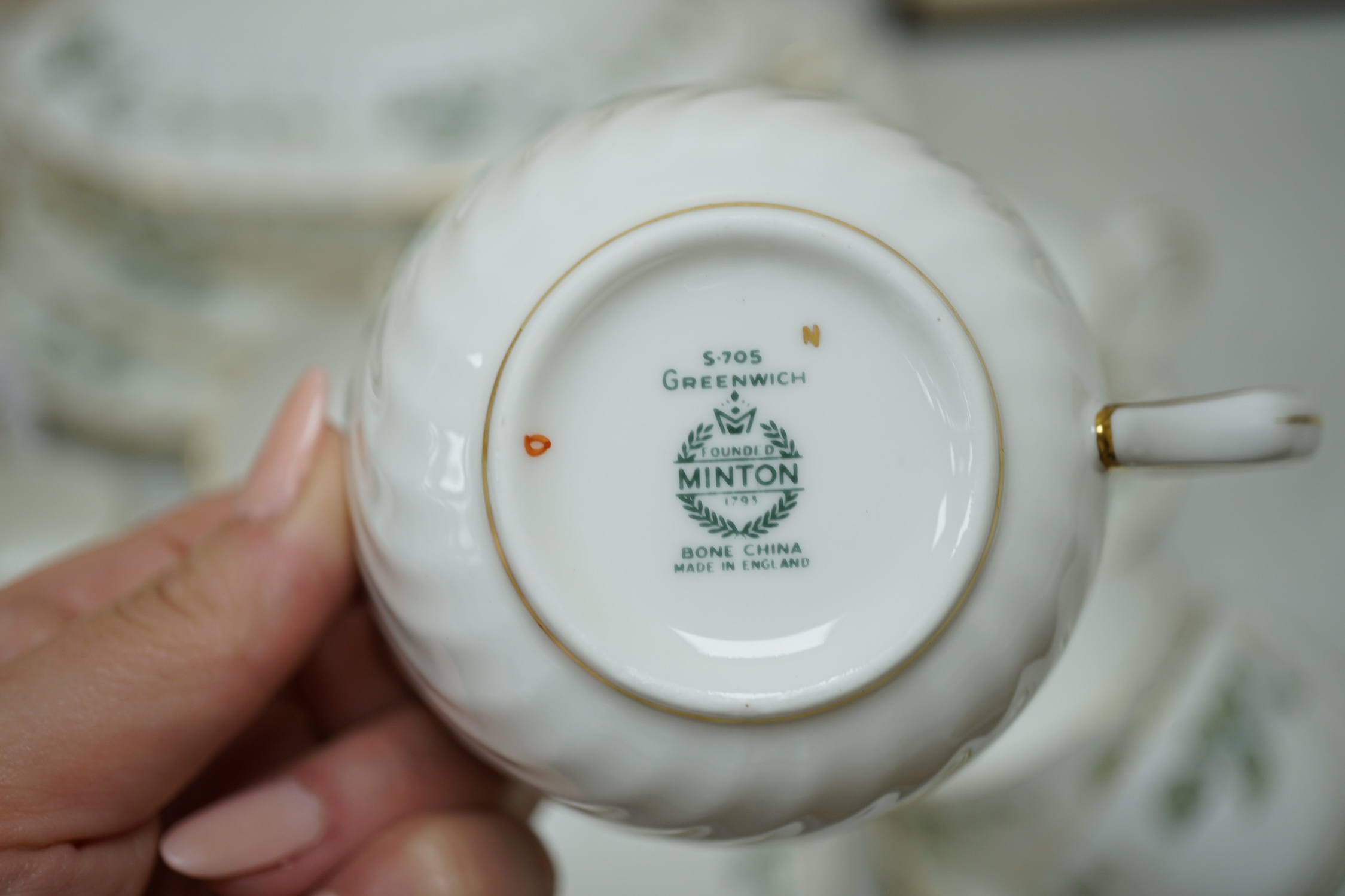 A Minton 'Greenwich pattern' bone china dinner and part tea service